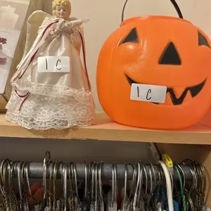 Plastic Halloween pumpkin and Christmas angel
