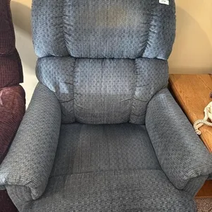 25x20x 38 in Blue rocking recliner. Some stains.
