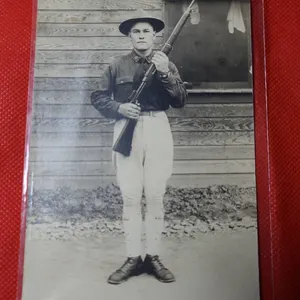 Early 20th Century Real Photo Postcard: Uniformed Soldier With Rifle, Posed Outdoors, Unused Backing