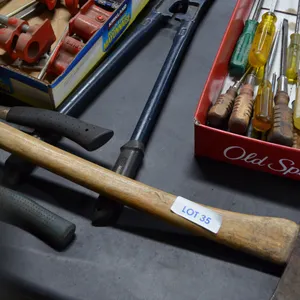 24" Bolt Cutter, Assortment of Screwdrivers, Big Axe with Wooden Handle, 2 small Axes, Box of Clamps, Seal Puller