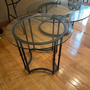 Three-piece matching end table set, one is oval, one small round, one large round.  Nice set.