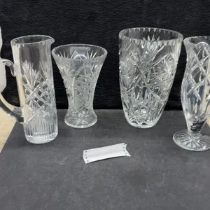 Cut Lead Crystal Pitcher, Vases, and Footed Vase With Geometric Starburst Patterns, Tallest 10”
