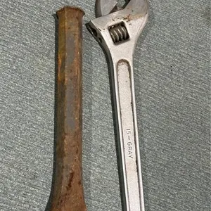 Large grey wrench and cold chisel
