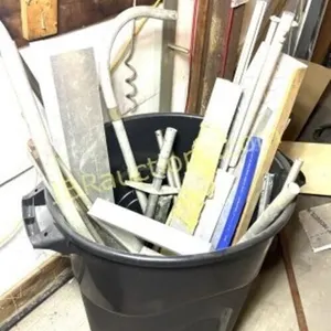TRASH CAN OF STORED MISC PARTS