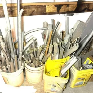 BUCKETS OF ALUMINUM PLANE PARTS
