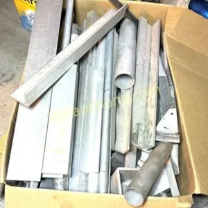 HEAVY BOX OF ALUMINUM PARTS AND PIECES