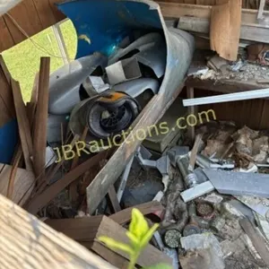 STORAGE BUILDING OF USED PARTS BEHING HANGER