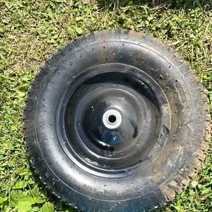 Utility tire with rim.  (GST 5% charged)
