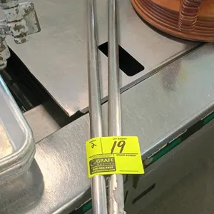 Stainless steel mixing paddles. Features all-metal construction with flat blades and tubular handles. Includes one 36"L paddle and one 42"L paddle.