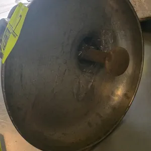 Hobart commercial meat grinder attachment. Features an aluminum housing, integrated feed pan, internal auger, and a wooden product pusher. Designed to