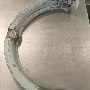 Hobart mixing bowl reducer. Designed to adapt a 60-quart mixer to accommodate a 40-quart bowl. Features cast metal construction with dual hand-turn ti