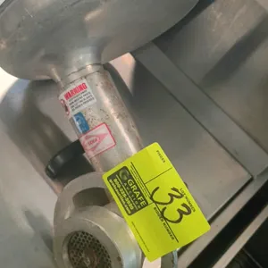 Intedge meat grinder attachment. Features cast metal construction with an integrated feed pan and square drive shaft designed for a standard power hub