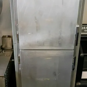 Metro C5 3 Series insulated heated holding and proofing cabinet. Features solid double Dutch doors, adjustable wire slides, and analog temperature and