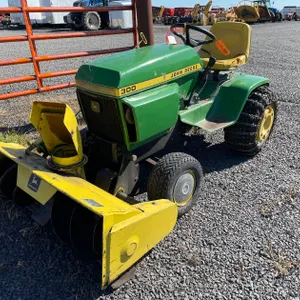 John Deere 300 Riding Lawn Mower With Snowblower/Deck/Front Blade (Mason, WI)