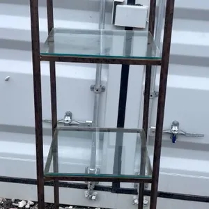 Metal and Glass Four-Tier Shelf Unit with Scroll Design