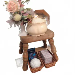 Decor Lot with Wooden Stool, Ceramic Jar, and Accessories