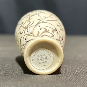 Decorative Collectibles Including Delft Pottery, Bells, and Boxes