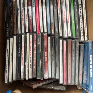 Box Lot of Country Music CDs Featuring Hit Artists