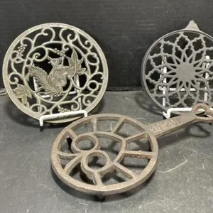 Cast Iron Trivets - One Stamped 1829