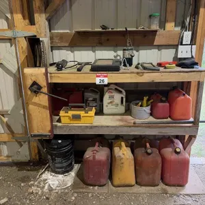 Contents On The Shelf Including Jerry Cans & More