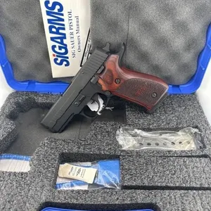 SIG P220 Elite 45 
Two 8 round clips and case