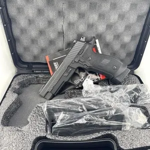 Ruger P226 9MM
Four 20 round clips with extended