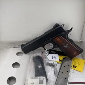 Ruger 1911 45 calExtra grips, two clips, and