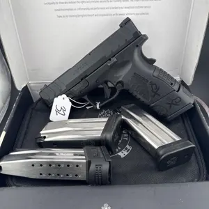 Springfield XP Elite 10MM
Two 15 round clips