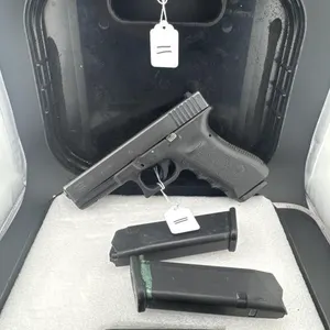 Glock 22 40 cal
Three 15 round clips and case