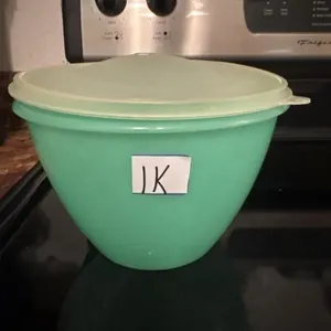 Green Tupperware bowl with lid
