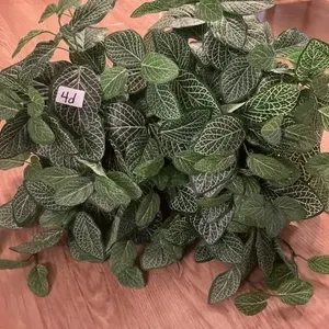 White wicker basket with greenery. 14L