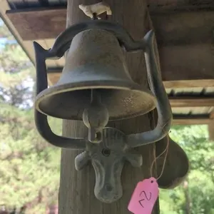 Metal longhorn cow bell, bell is stationary