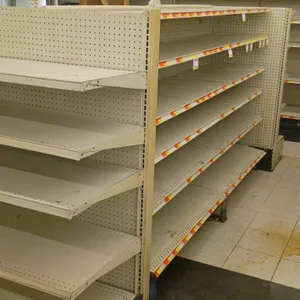 24'L of Madix gondola shelving. Features an off-white finish, pegboard backing, 22" double-sided base shelves, and 60"H uprights with adjustable upper