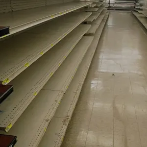 132'L of Madix gondola shelving. Features off-white finish, 72"H uprights, pegboard backing, and 25"/25" double-sided base shelves. Contents and aisle