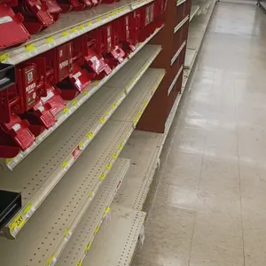 126'L of Madix gondola shelving. Features off-white finish, 78"H uprights, and 25"/25" double-sided base shelves. Contents and aisle signage not inclu