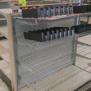 8'L of Madix gondola shelving. Double-sided unit features adjustable beige metal shelving on one side and wire shelves with plastic product dividers o