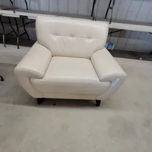 Cream Leather/leather style comfy Armchair