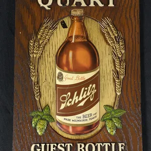 PRESSED FIBRE MATERIAL SIGN SHARE A QUART SCHLITZ BEER GUEST BOTTLE JUST THE KISS OF THE HOPS
