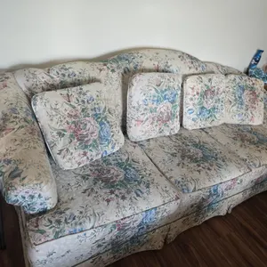 Three cushioned floral design couch