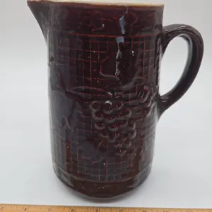 Antique north star brown glazed pitcher