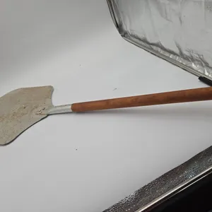 Vintage wooden handled pizza peel