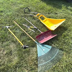 Snow scoops, rake, grass shears, and hedge shear