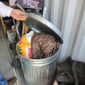 Trash Can w/Lid, 2 bags of ice melt, mulch, tarp