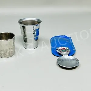 2 shot glasses & tourist spoon
