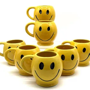 Vintage Smiley Face McCoy Pottery Mugs 3.75”
-