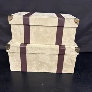 2 stacking boxes with felt covers, larger one is