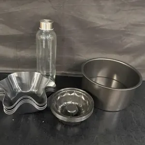 Kitchen tins and a glass bottle - looks new