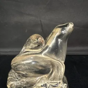 Sea lion soapstone sculpture, cannot make out