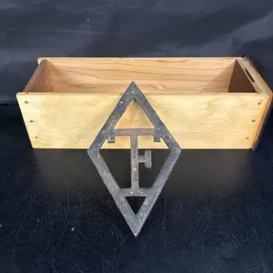 Vintage T.F. Eaton trivet, cast iron