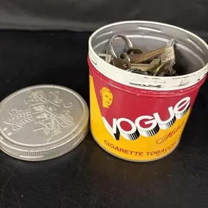 Tin of vintage keys